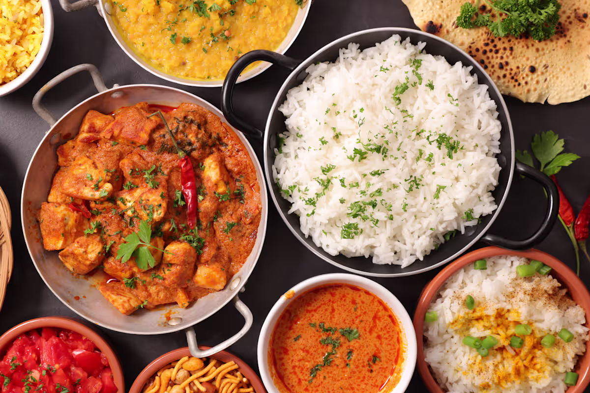 Empyrean Indian Kitchen signature dishes Butter Chicken + Basmati RiceDhaba Dal Makhani + Basmati RicePaneer Tikka Masala + Basmati Rice